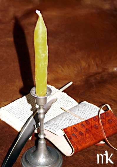 Eine Bienenwachskerze